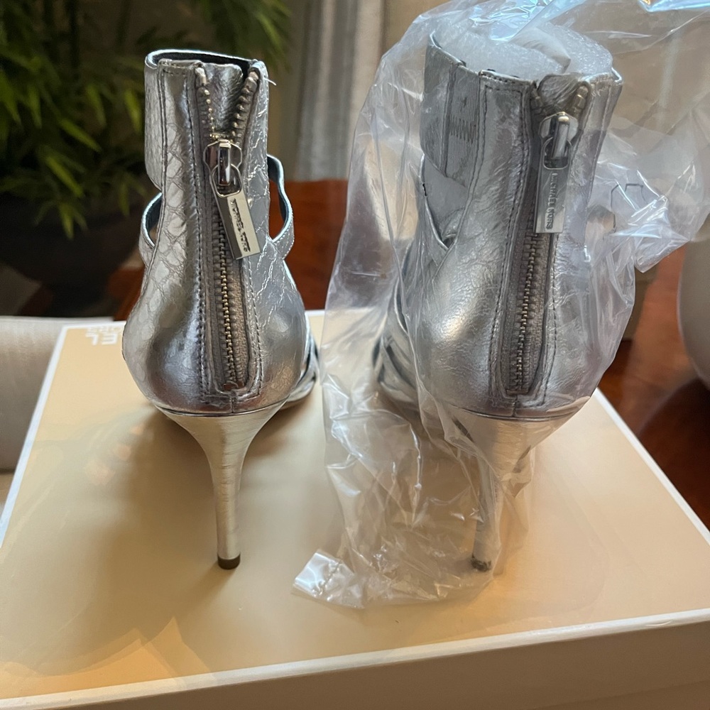 Michael Kors metallic silver High heel sandals . Brand New . Never worn